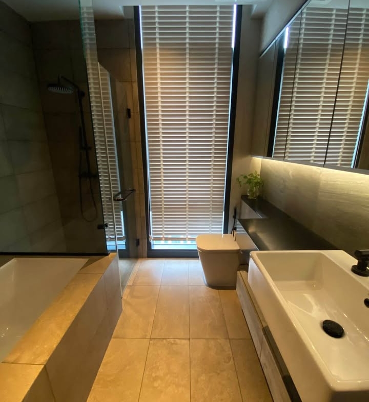 Modern 2BR 1BA condo at The Lofts Asoke, 75 sqm, high floor, fully furnished, prime Sukhumvit location, near MRT and BTS. Minimum 1-year lease.