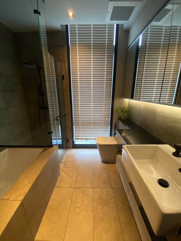 Modern 2BR 1BA condo at The Lofts Asoke, 75 sqm, high floor, fully furnished, prime Sukhumvit location, near MRT and BTS. Minimum 1-year lease.