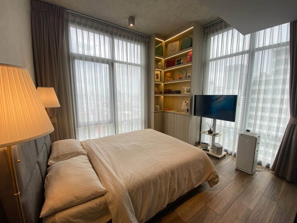 Modern 2BR 1BA condo at The Lofts Asoke, 75 sqm, high floor, fully furnished, prime Sukhumvit location, near MRT and BTS. Minimum 1-year lease.