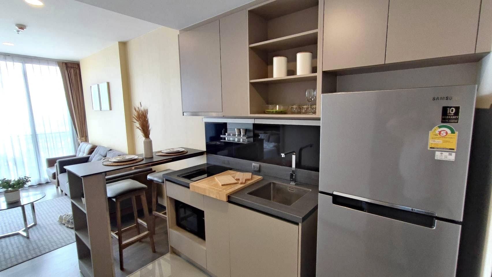Stylish 1-bed 1-bath condo at Oka Haus Sukhumvit 36, 34.27 sqm, 30th floor river view. For sale at 5.2M. Modern amenities and prime location.
