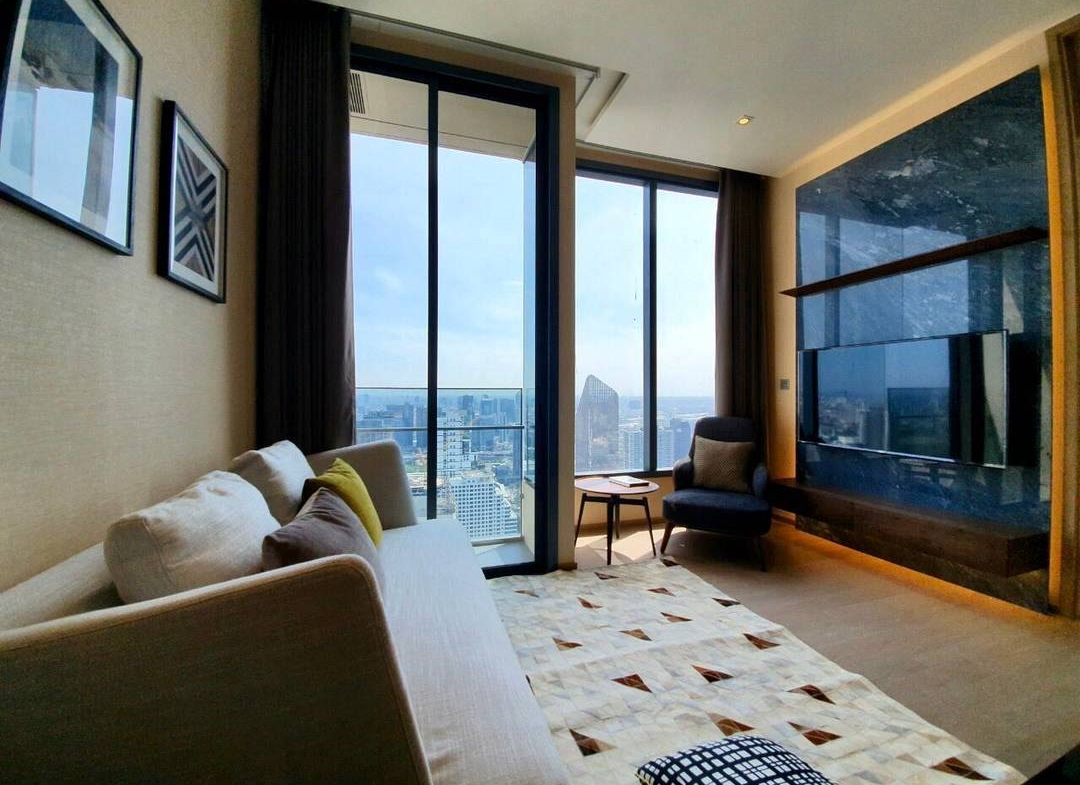 Luxury 1-Bedroom condo at The ESSE Asoke, 44.5 sqm, fully furnished, available for rent at 50K/month. Prime location, close to BTS, MRT, and Terminal 21.