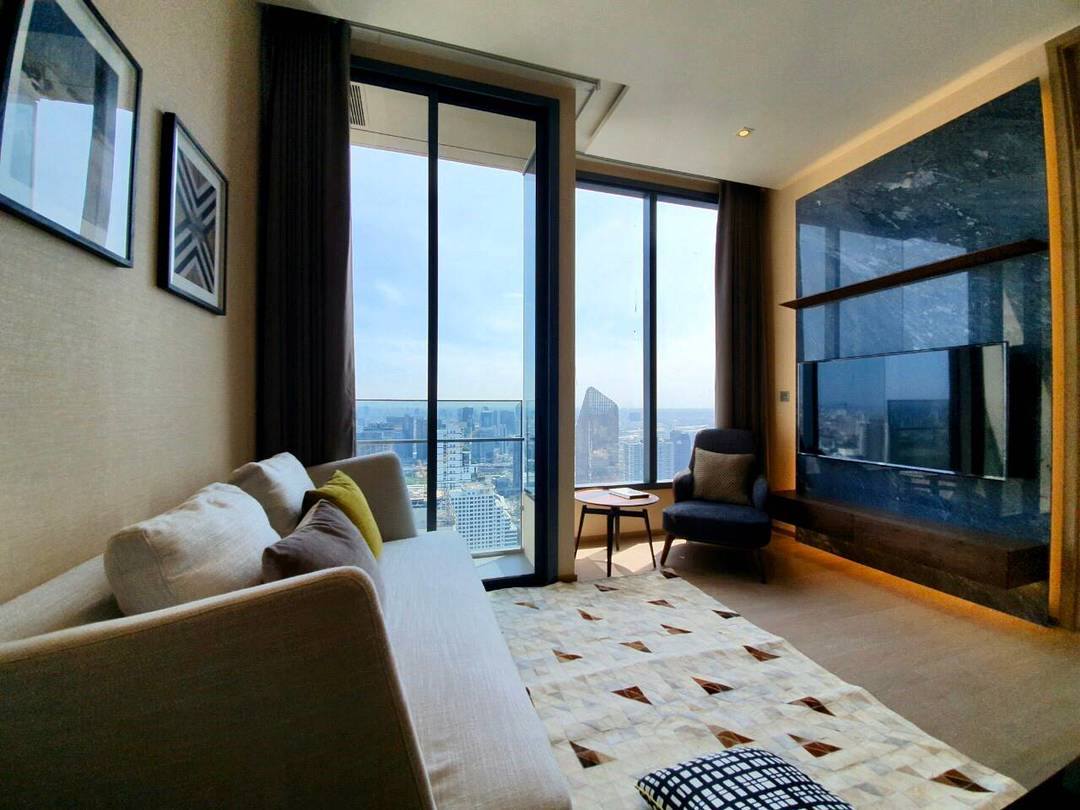 Luxury 1-Bedroom condo at The ESSE Asoke, 44.5 sqm, fully furnished, available for rent at 50K/month. Prime location, close to BTS, MRT, and Terminal 21.