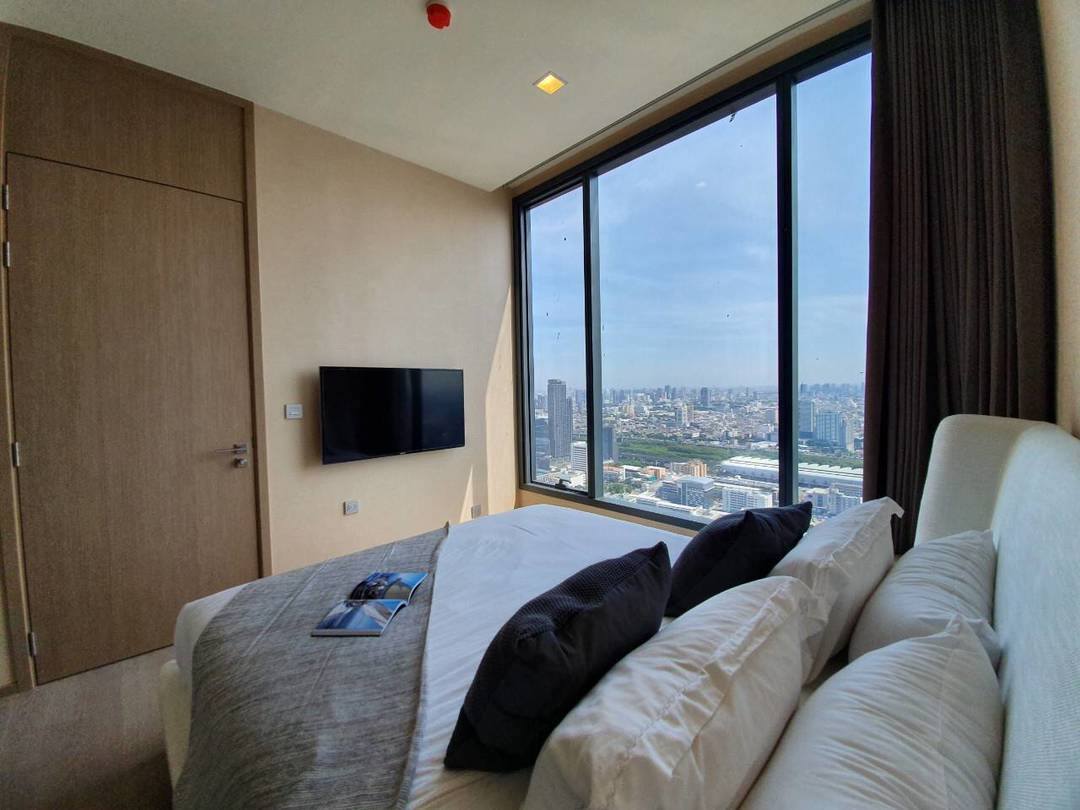 Luxury 1-Bedroom condo at The ESSE Asoke, 44.5 sqm, fully furnished, available for rent at 50K/month. Prime location, close to BTS, MRT, and Terminal 21.