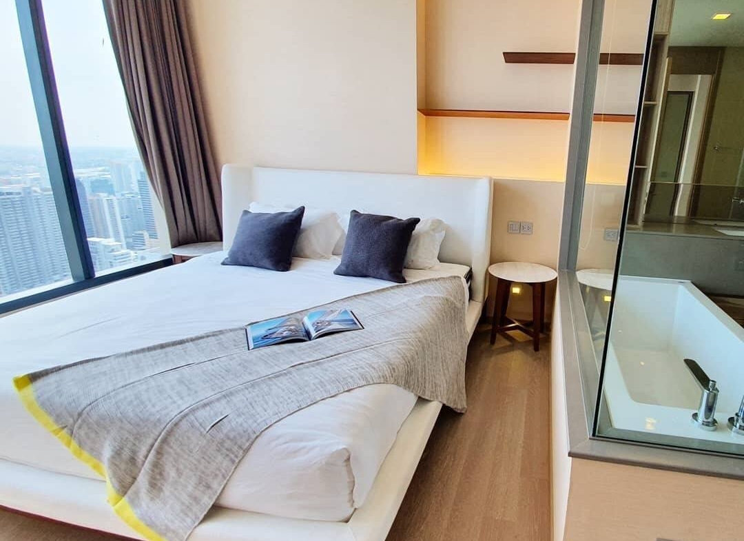 Luxury 1-Bedroom condo at The ESSE Asoke, 44.5 sqm, fully furnished, available for rent at 50K/month. Prime location, close to BTS, MRT, and Terminal 21.