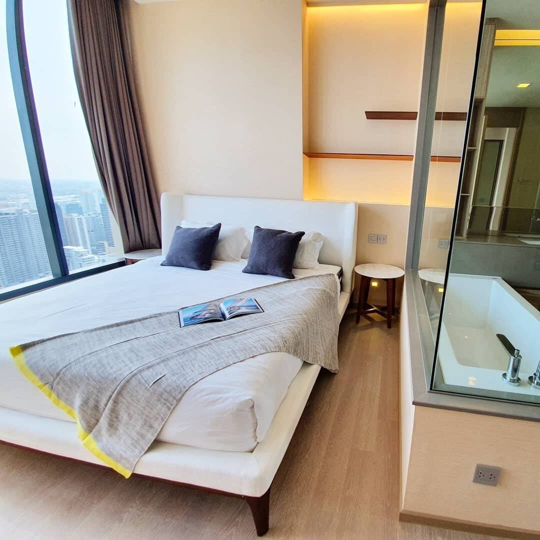 Luxury 1-Bedroom condo at The ESSE Asoke, 44.5 sqm, fully furnished, available for rent at 50K/month. Prime location, close to BTS, MRT, and Terminal 21.