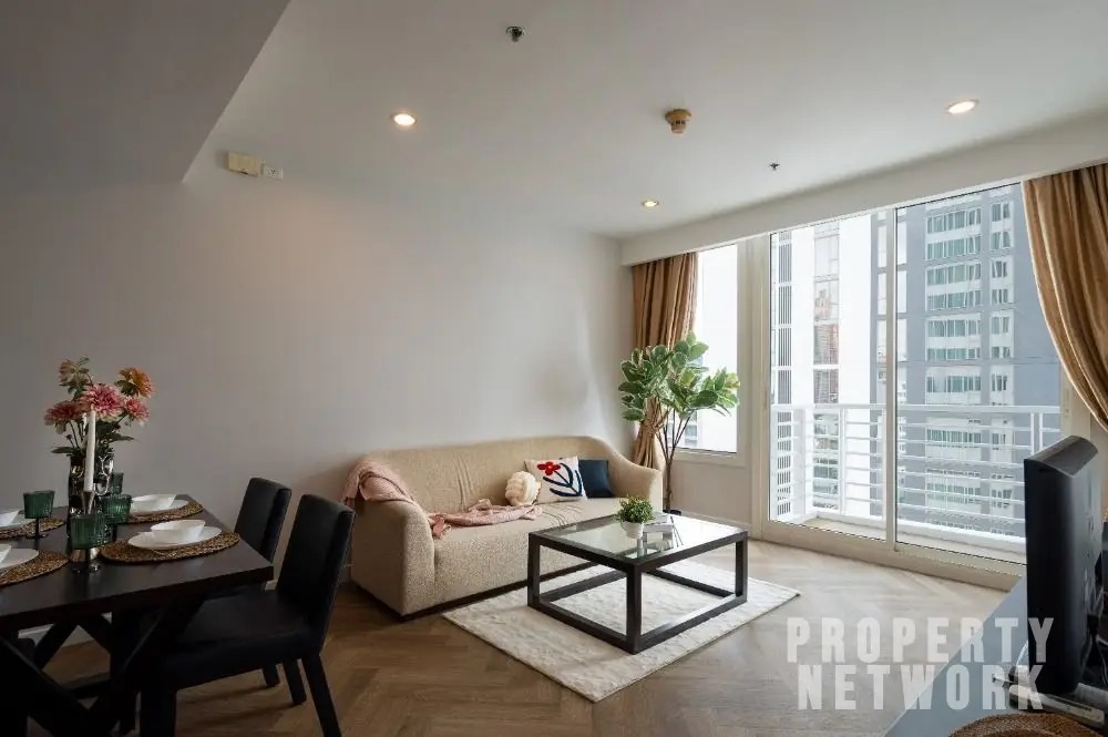 Luxury 1-bedroom condo in Siri Residence, 61 sqm, 14th floor, 2 balconies, 200m from Phrom Phong BTS. For sale at 10.5M THB. Prime location!