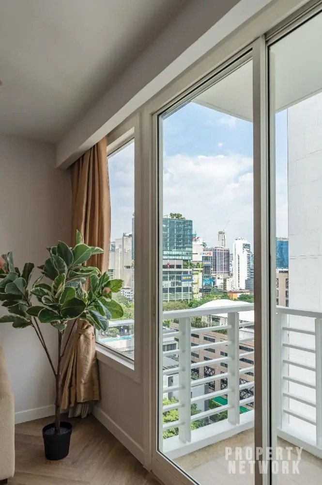 Luxury 1-bedroom condo in Siri Residence, 61 sqm, 14th floor, 2 balconies, 200m from Phrom Phong BTS. For sale at 10.5M THB. Prime location!