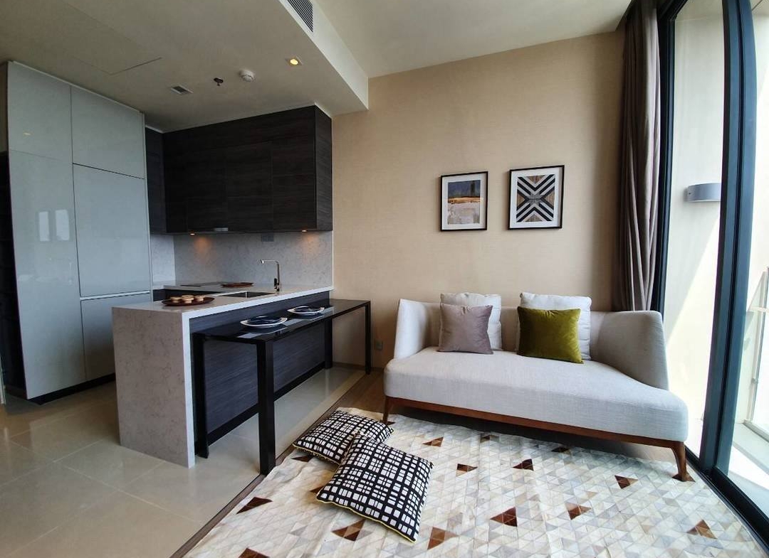 Luxury 1-Bedroom condo at The ESSE Asoke, 44.5 sqm, fully furnished, available for rent at 50K/month. Prime location, close to BTS, MRT, and Terminal 21.
