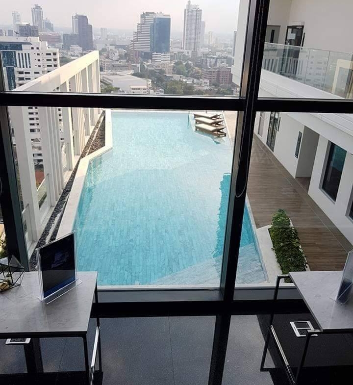 Spacious 2BR 2BA condo at M Thonglor 10, 57.5 sqm, 18th floor, fully furnished, near BTS, pet-friendly, rent 45,000 THB/month, move-in April 2025.