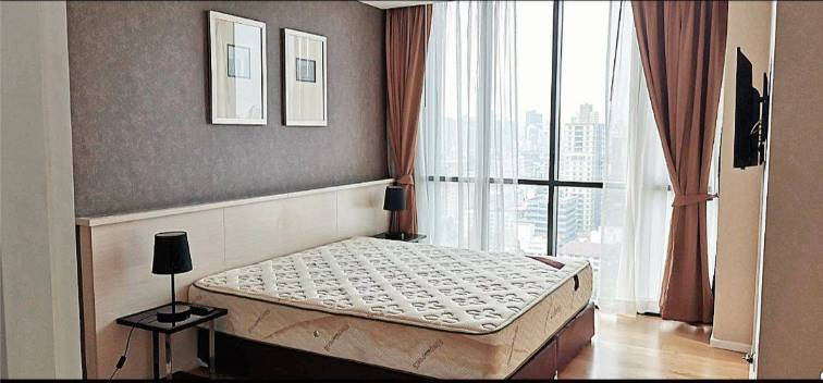 Pet-friendly 2-bed, 2-bath condo at Estella Ekkamai, 59.42 sqm, fully furnished, 24th floor, top facilities. Only 35,000 THB/month. Available March 31, 2025.