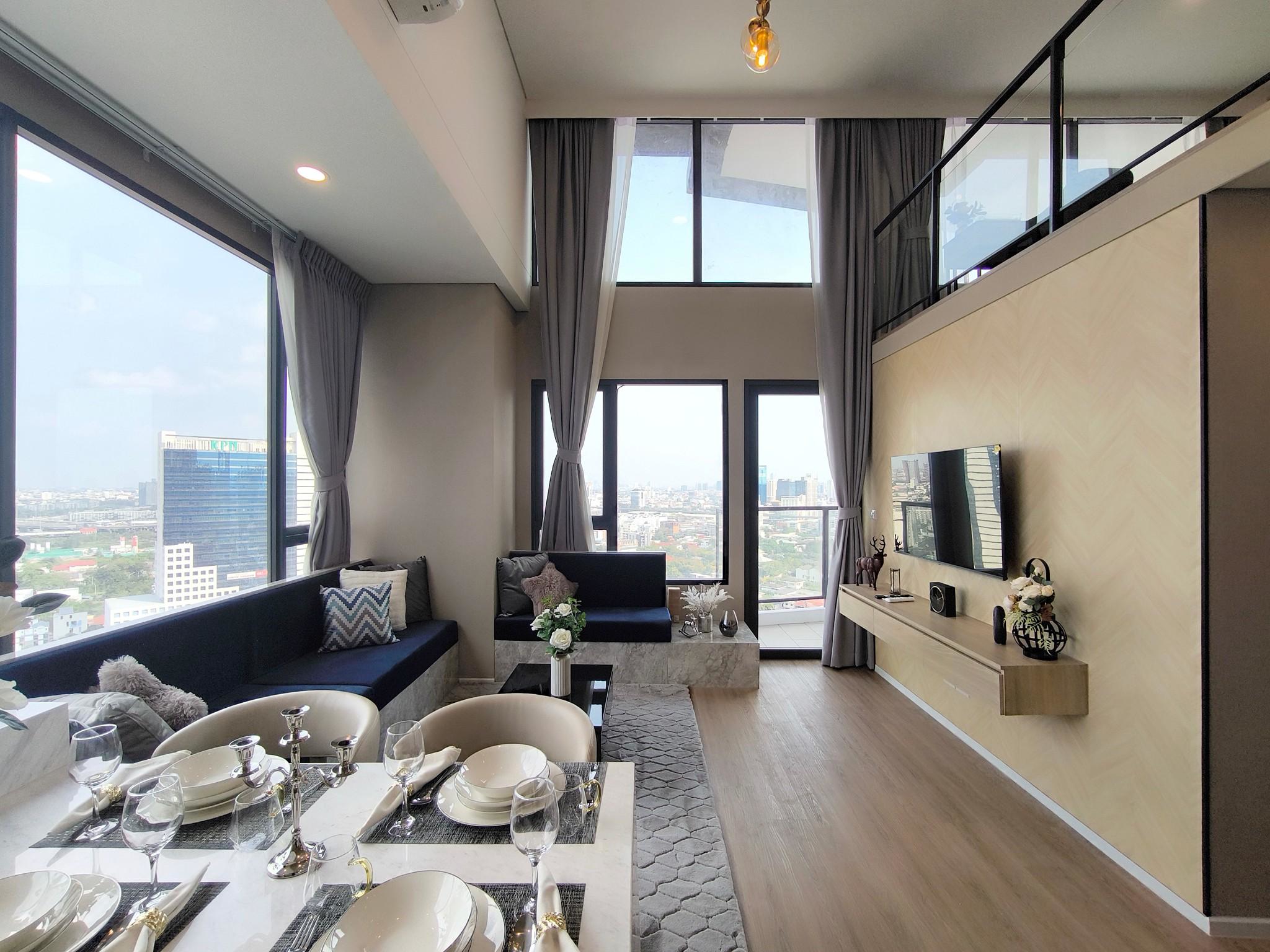 Modern 2-bed, 2-bath duplex condo at Siamese Rama 9. 65 sq.m on 17F, fully furnished. Just minutes to MRT Rama 9. Rent 55,000 THB/month. Ready to move in.