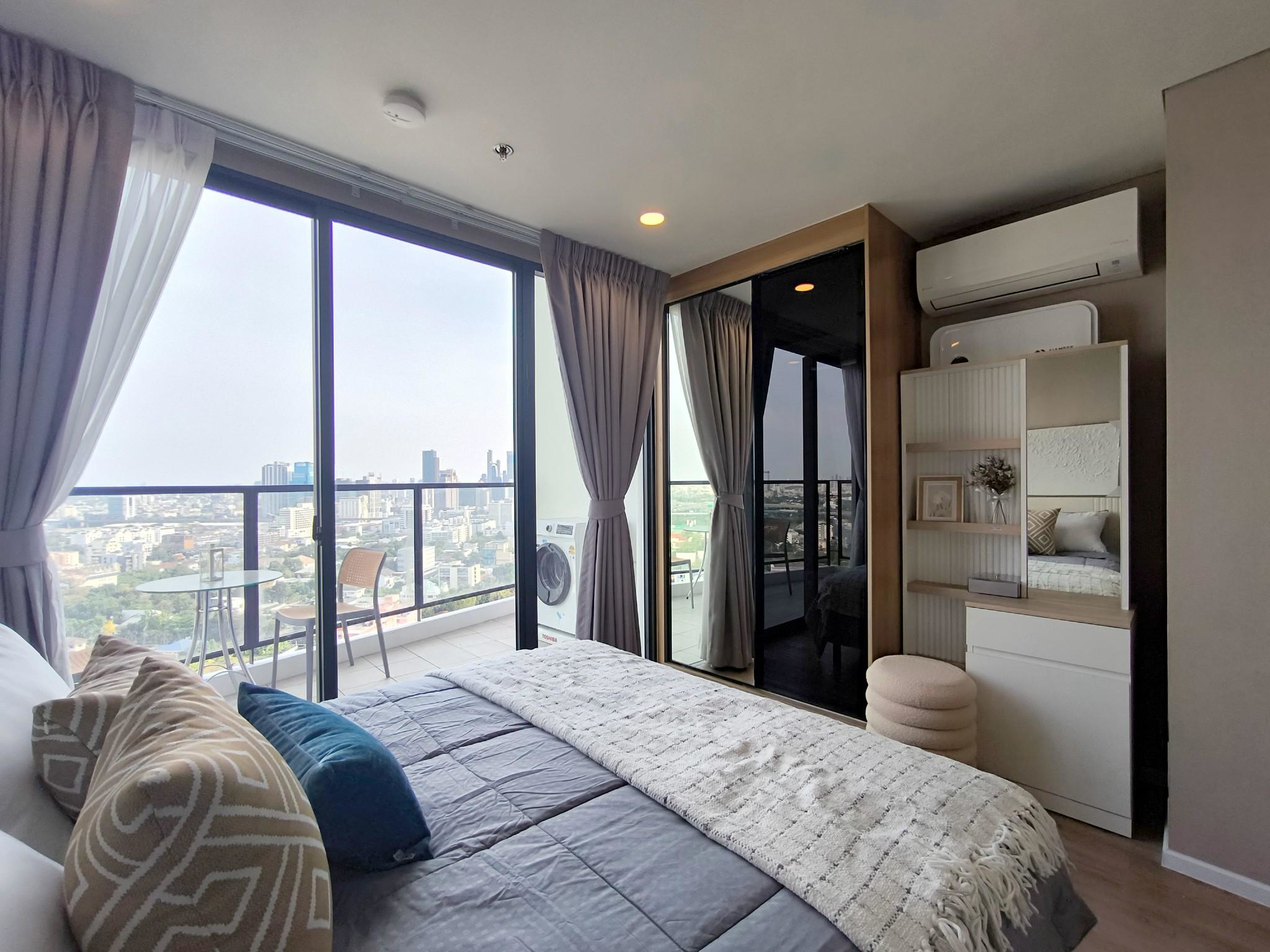 Modern 2-bed, 2-bath duplex condo at Siamese Rama 9. 65 sq.m on 17F, fully furnished. Just minutes to MRT Rama 9. Rent 55,000 THB/month. Ready to move in.