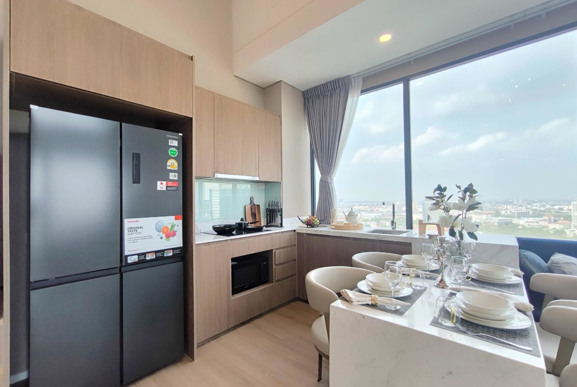Modern 2-bed, 2-bath duplex condo at Siamese Rama 9. 65 sq.m on 17F, fully furnished. Just minutes to MRT Rama 9. Rent 55,000 THB/month. Ready to move in.