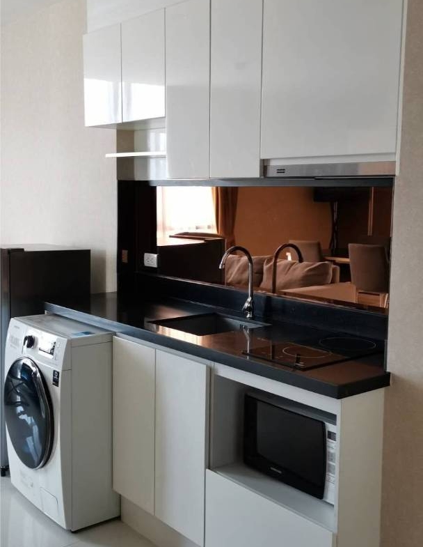 Pet-friendly 2-bed, 2-bath condo at Estella Ekkamai, 59.42 sqm, fully furnished, 24th floor, top facilities. Only 35,000 THB/month. Available March 31, 2025.