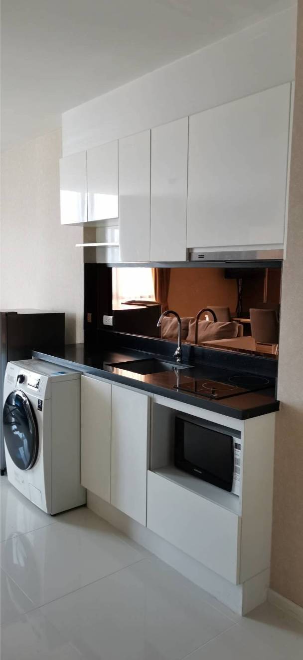 Pet-friendly 2-bed, 2-bath condo at Estella Ekkamai, 59.42 sqm, fully furnished, 24th floor, top facilities. Only 35,000 THB/month. Available March 31, 2025.