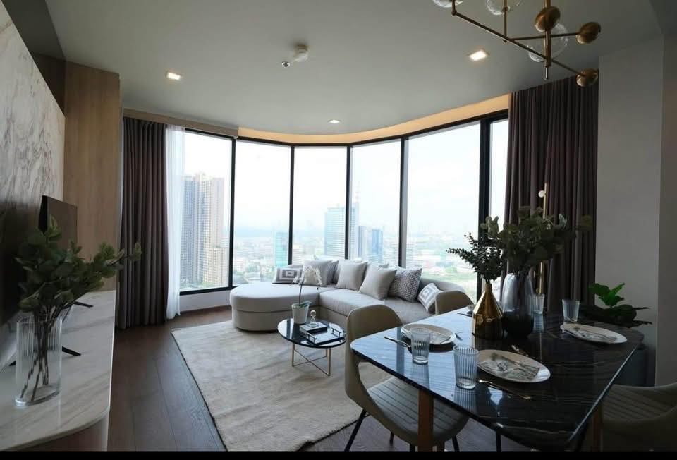 Luxury 2BR 2BA 63sqm condo at Ideo Q Sukhumvit 36 for rent, high floor, modern amenities, near BTS Thong Lo. 60,000 THB/month. Prime location.
