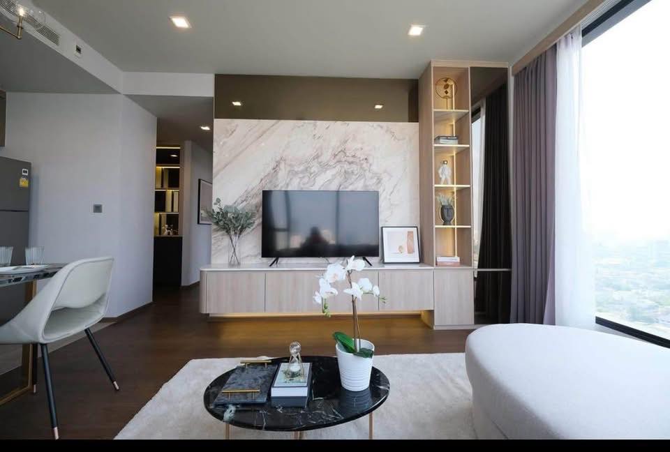 Luxury 2BR 2BA 63sqm condo at Ideo Q Sukhumvit 36 for rent, high floor, modern amenities, near BTS Thong Lo. 60,000 THB/month. Prime location.