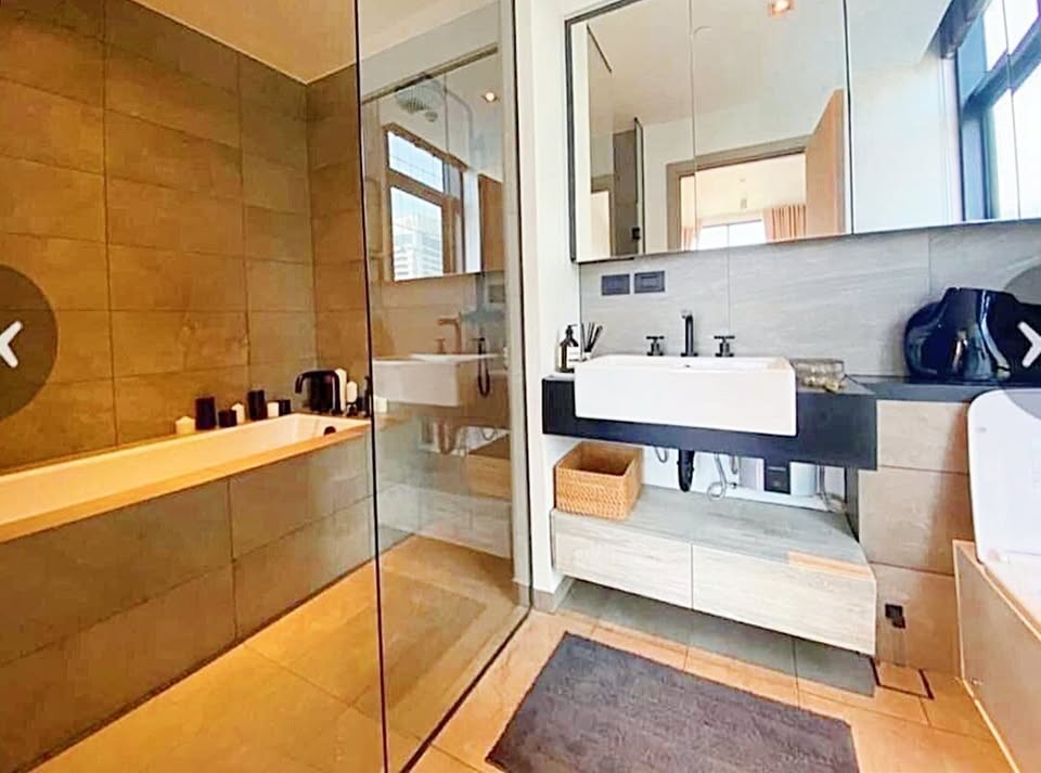 Stylish 2BR 2BA condo at The Lofts Asoke, 86 sqm, fully furnished, prime Sukhumvit location near MRT, BTS, Airport Link. Rent 80,000 THB/month.