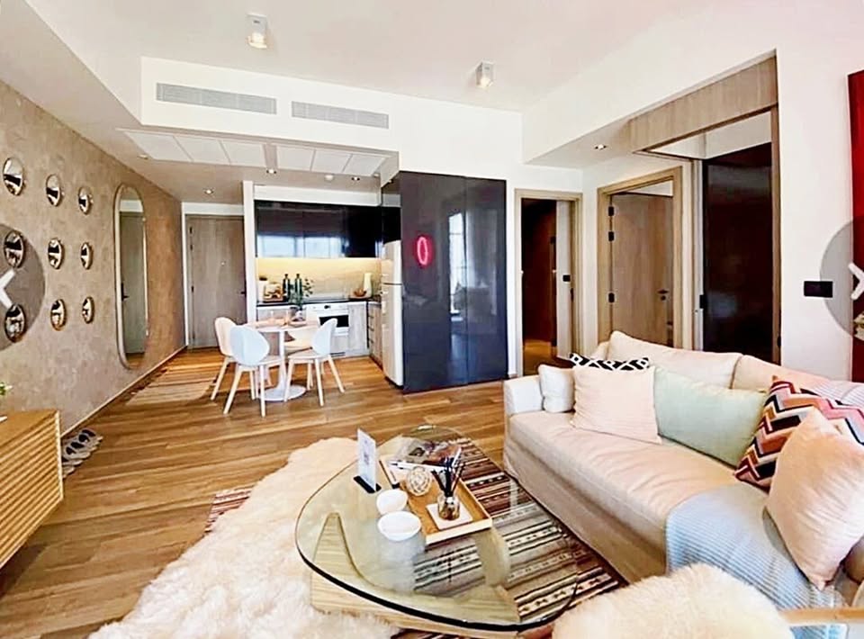 Stylish 2BR 2BA condo at The Lofts Asoke, 86 sqm, fully furnished, prime Sukhumvit location near MRT, BTS, Airport Link. Rent 80,000 THB/month.