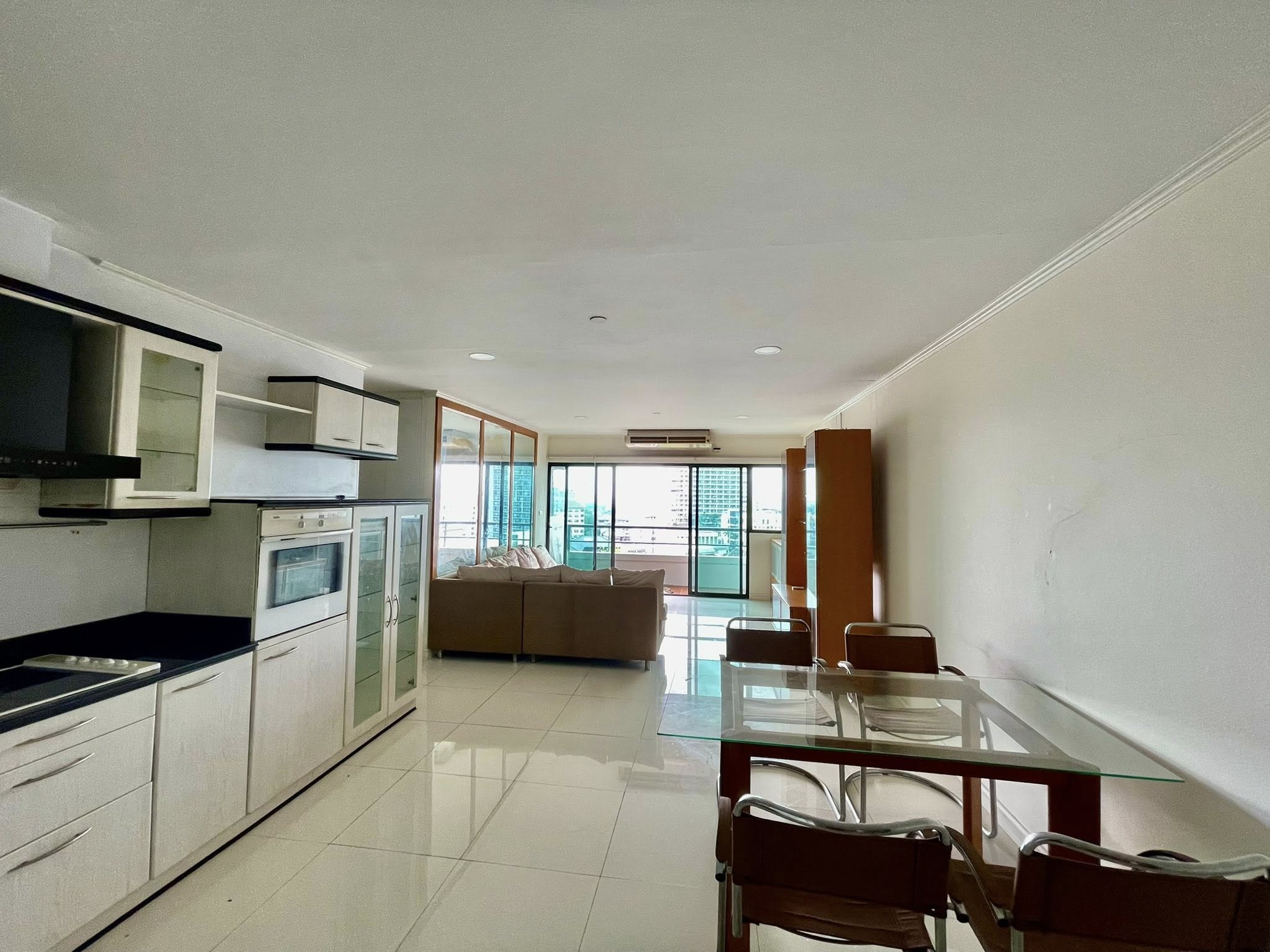 Spacious 2 bed condo at Sathorn Gardens, 94 sqm on 9th floor. Rent ฿40,000/month or buy for ฿11M. Walk to BTS, MRT, Silom & Lumpini Park.